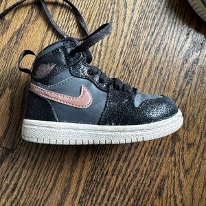 Nike Black and Pink Sneakers with Metallic Swoosh